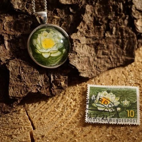 Amulett aus Briefmarke "Schützt die Pflanzen"